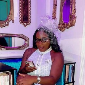 Elegant White Fascinator with Netting